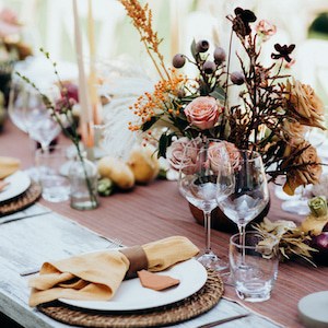 Beautiful wedding table decoration and setting in rustic / village style. Italian wedding.